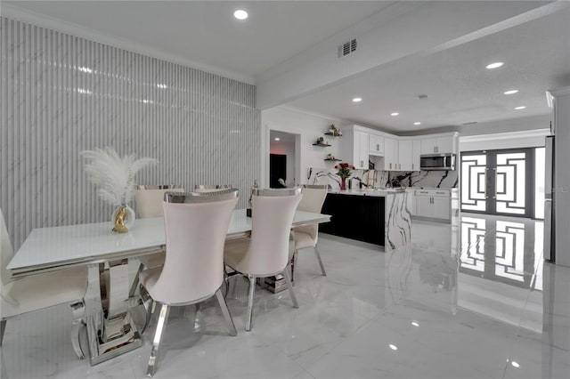 18852 Tracer Dr, Lutz, FL 33549 - dining space featuring ornamental molding, light marble finish flooring, and recessed lighting