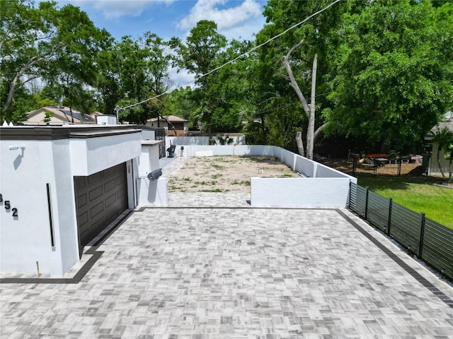 18852 Tracer Dr, Lutz, FL 33549 - view of patio / terrace with driveway