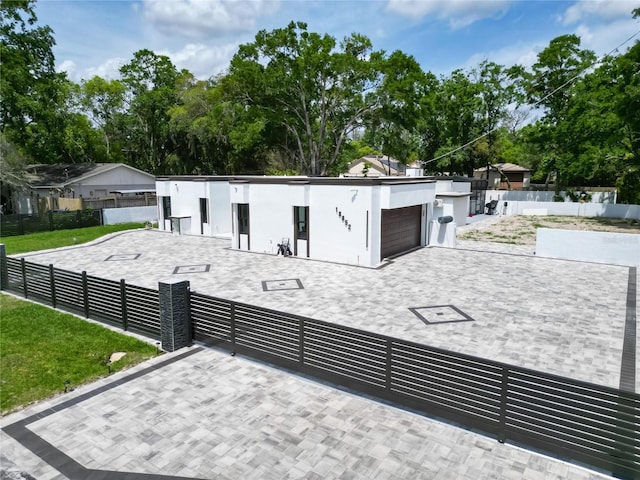 18852 Tracer Dr, Lutz, FL 33549 - contemporary house with a garage and decorative driveway