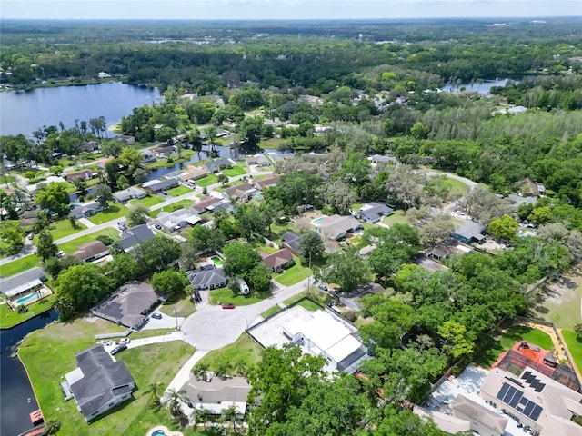 18852 Tracer Dr, Lutz, FL 33549 - aerial overview of property's location with a large body of water and nearby suburban area