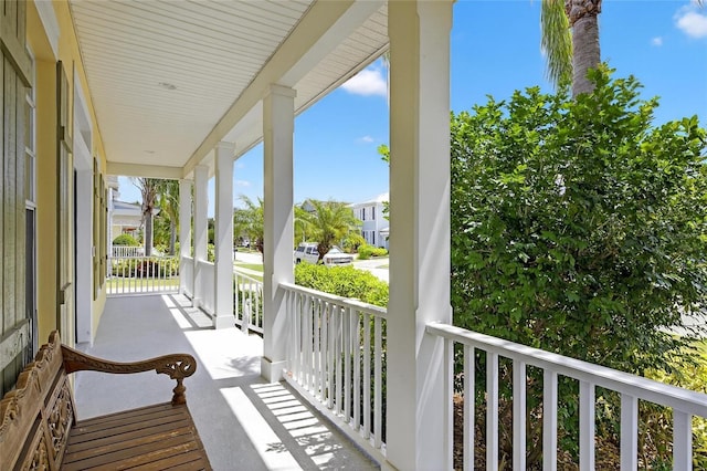5720 Tortoise Pl, Apollo Beach, FL 33572 - covered porch featuring a residential view