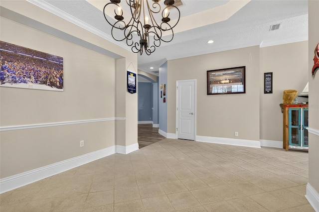 5720 Tortoise Pl, Apollo Beach, FL 33572 - unfurnished room featuring recessed lighting, light tile patterned floors, a textured ceiling, a chandelier, and crown molding