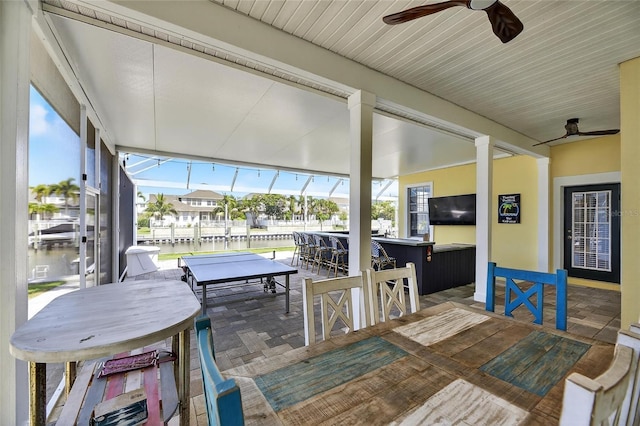 5720 Tortoise Pl, Apollo Beach, FL 33572 - sunroom / solarium with a ceiling fan and a water view