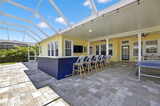 5720 Tortoise Pl, Apollo Beach, FL 33572 - view of patio / terrace with a ceiling fan and glass enclosure
