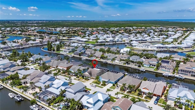 5720 Tortoise Pl, Apollo Beach, FL 33572 - aerial view of property's location with nearby suburban area and a nearby body of water