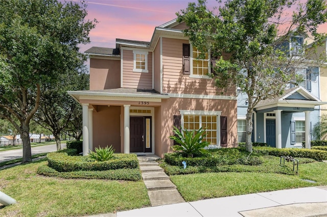 1395 Alston Bay Blvd, Apopka, FL 32703 - view of front of home with a yard and stucco siding