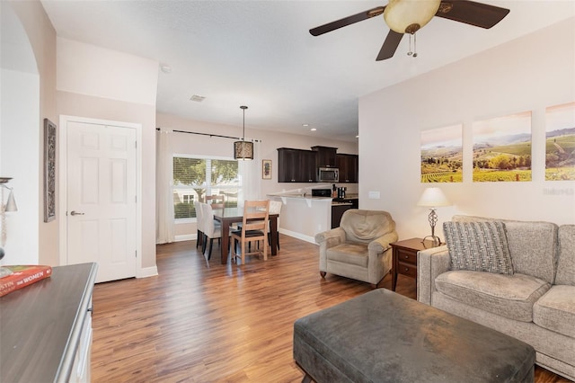 1395 Alston Bay Blvd, Apopka, FL 32703 - living area featuring light wood-type flooring and a ceiling fan