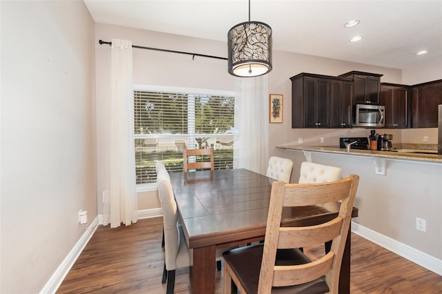 1395 Alston Bay Blvd, Apopka, FL 32703 - dining space with dark wood-style floors and recessed lighting