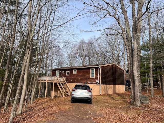 123 Rocky Rd, Lackawaxen, PA 18435 - view of front of home with stairs and a deck