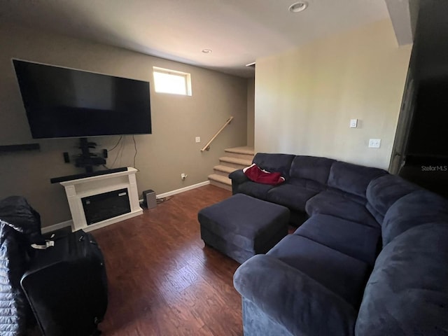 123 Rocky Rd, Lackawaxen, PA 18435 - living area with stairs, wood finished floors, a glass covered fireplace, and recessed lighting