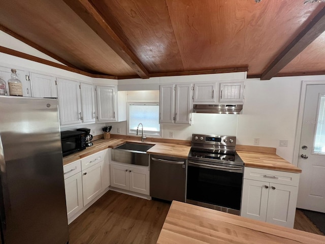 123 Rocky Rd, Lackawaxen, PA 18435 - kitchen with butcher block counters, stainless steel appliances, wood ceiling, under cabinet range hood, and dark wood-type flooring