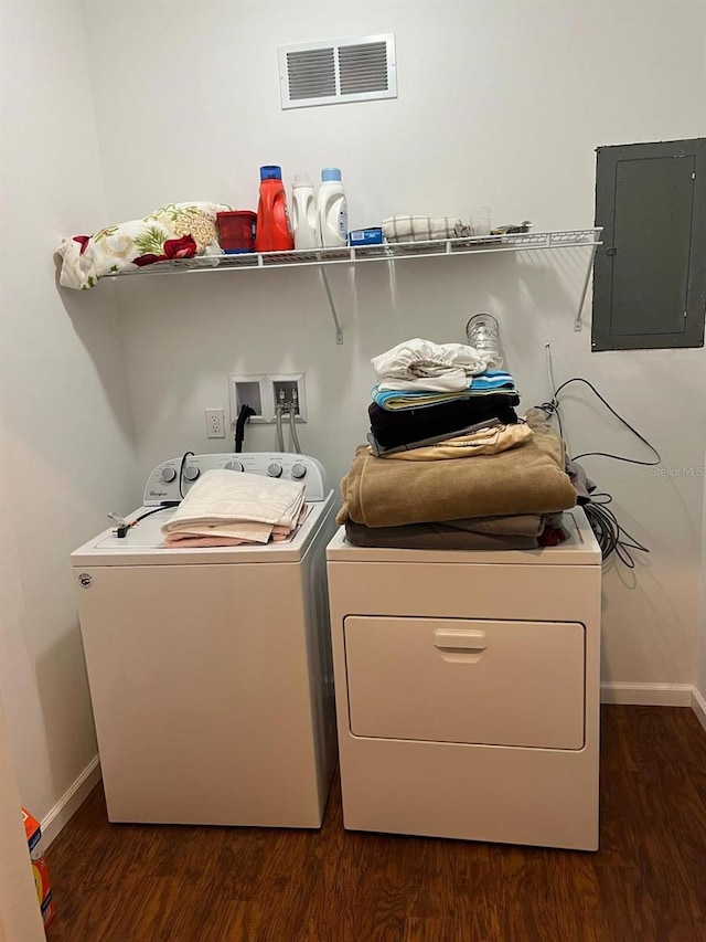 123 Rocky Rd, Lackawaxen, PA 18435 - laundry area featuring electric panel, washing machine and dryer, and dark wood-style flooring