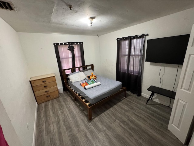 6951 NW 5th Ct, Miami, FL 33150 - bedroom with wood finished floors and baseboards