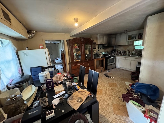 6951 NW 5th Ct, Miami, FL 33150 - dining room with light tile patterned flooring