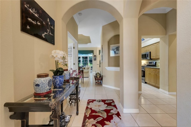 3503 92nd Ave E, Parrish, FL 34219 - corridor featuring arched walkways, light tile patterned flooring, and ornamental molding