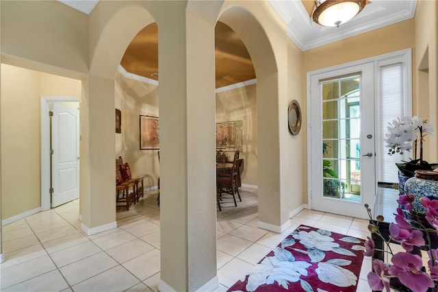 3503 92nd Ave E, Parrish, FL 34219 - foyer with ornamental molding, plenty of natural light, light tile patterned floors, and arched walkways