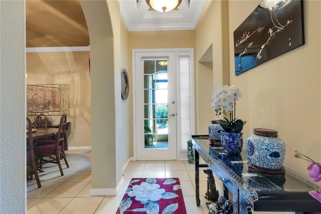 3503 92nd Ave E, Parrish, FL 34219 - foyer featuring ornamental molding, arched walkways, and tile patterned flooring