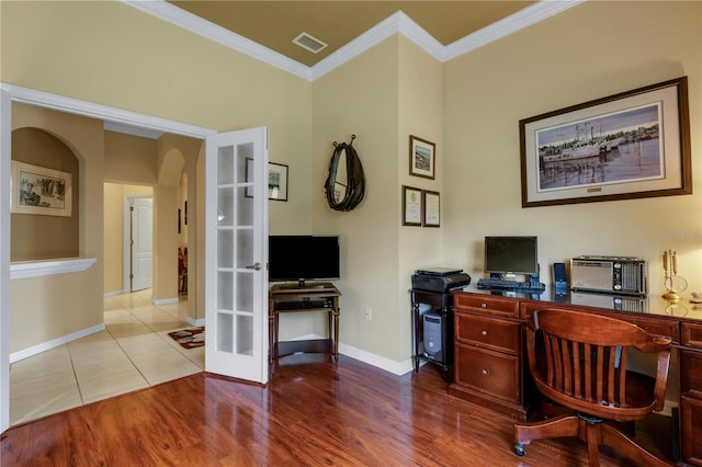 3503 92nd Ave E, Parrish, FL 34219 - home office featuring french doors, crown molding, arched walkways, and wood finished floors