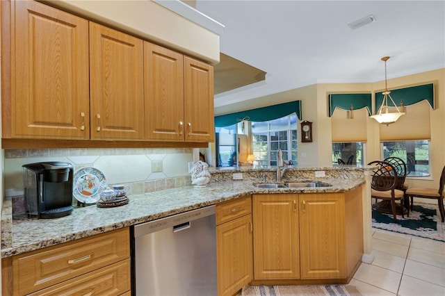 3503 92nd Ave E, Parrish, FL 34219 - kitchen featuring dishwasher, a peninsula, light stone countertops, decorative backsplash, and light tile patterned floors