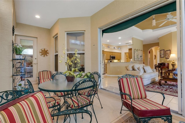 3503 92nd Ave E, Parrish, FL 34219 - dining room featuring arched walkways, ceiling fan, and recessed lighting