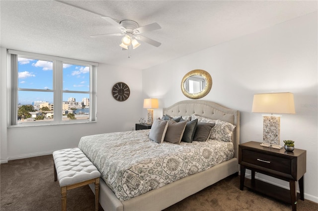 400 Island Way Unit 503, Clearwater Beach, FL 33767 - carpeted bedroom featuring baseboards and ceiling fan