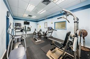 400 Island Way Unit 503, Clearwater Beach, FL 33767 - exercise room featuring a drop ceiling