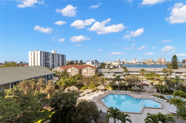 400 Island Way Unit 503, Clearwater Beach, FL 33767 - community pool featuring a patio, a water view, and a view of city
