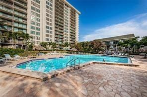 400 Island Way Unit 503, Clearwater Beach, FL 33767 - community pool featuring a patio