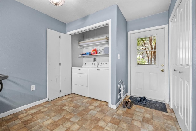 6607 S Merleing Loop, Floral City, FL 34436 - washroom with washer and clothes dryer and stone finish flooring