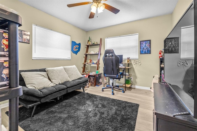 6607 S Merleing Loop, Floral City, FL 34436 - home office with ceiling fan and light wood finished floors