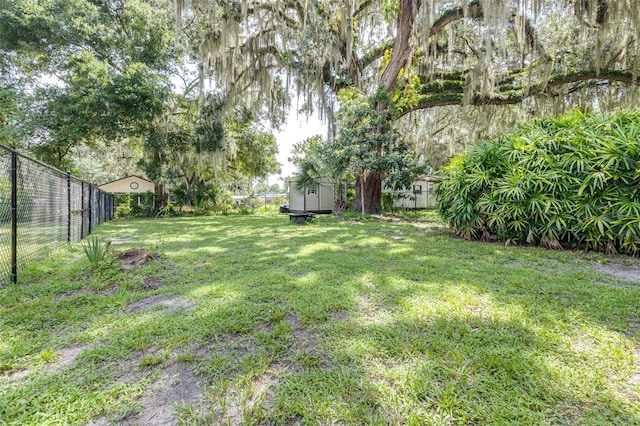 6607 S Merleing Loop, Floral City, FL 34436 - view of yard featuring a shed
