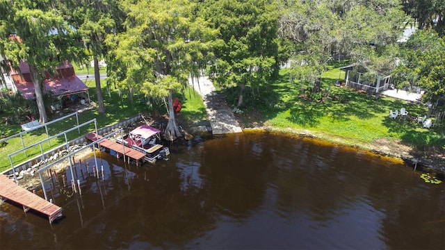 6607 S Merleing Loop, Floral City, FL 34436 - dock featuring a lawn and a water view