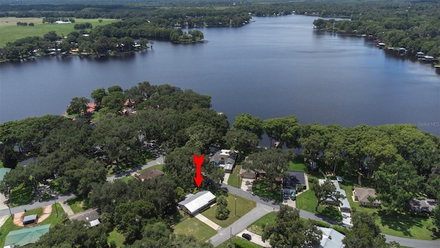 6607 S Merleing Loop, Floral City, FL 34436 - aerial view of property and surrounding area with a large body of water and a heavily wooded area