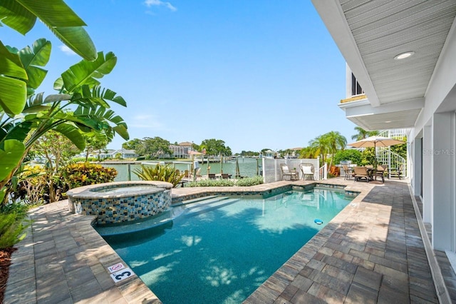 4545 Harbor Hills Dr, Largo, FL 33770 - view of pool with a pool with connected hot tub, a patio area, and outdoor dining area