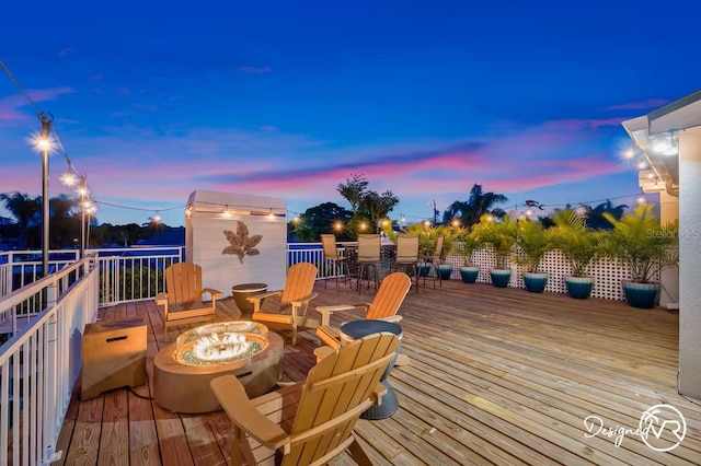 4545 Harbor Hills Dr, Largo, FL 33770 - wooden terrace with an outdoor fire pit