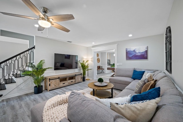 4545 Harbor Hills Dr, Largo, FL 33770 - living area with wood finished floors, ceiling fan, and recessed lighting