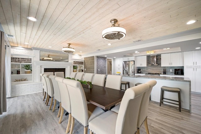 4545 Harbor Hills Dr, Largo, FL 33770 - dining area with wood ceiling, light wood-type flooring, and recessed lighting