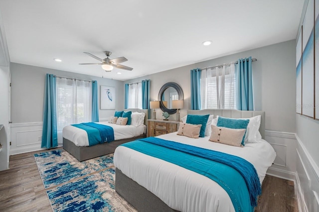 4545 Harbor Hills Dr, Largo, FL 33770 - bedroom with a decorative wall, a wainscoted wall, wood finished floors, a ceiling fan, and recessed lighting