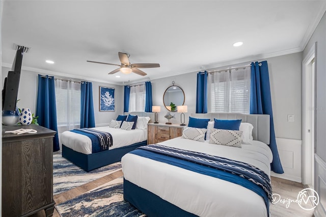 4545 Harbor Hills Dr, Largo, FL 33770 - bedroom with crown molding, wood finished floors, a ceiling fan, wainscoting, and recessed lighting