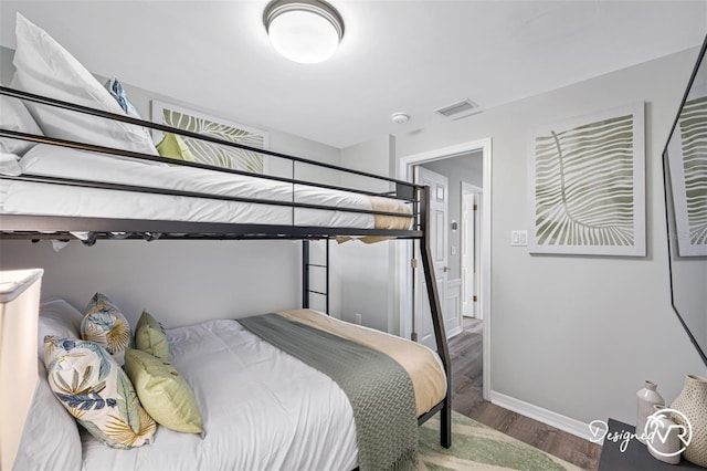 4545 Harbor Hills Dr, Largo, FL 33770 - bedroom featuring wood finished floors and baseboards