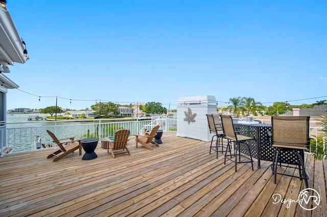 4545 Harbor Hills Dr, Largo, FL 33770 - wooden deck with a water view