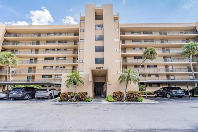 2617 Cove Cay Dr Unit 706, Clearwater, FL 33760 - view of apartment building / complex featuring covered parking