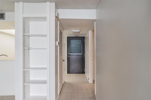 2617 Cove Cay Dr Unit 706, Clearwater, FL 33760 - hall featuring light tile patterned floors