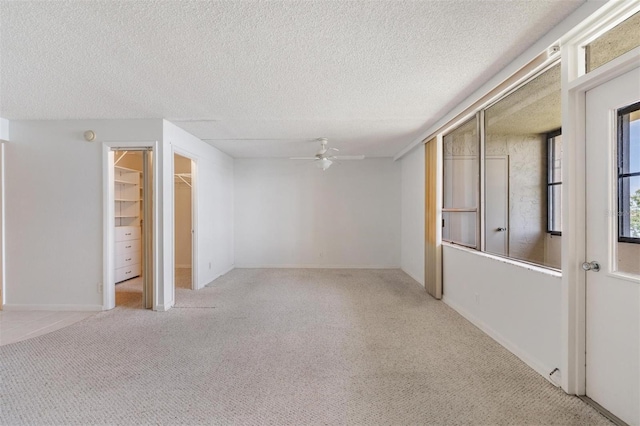 2617 Cove Cay Dr Unit 706, Clearwater, FL 33760 - carpeted empty room with a ceiling fan and a textured ceiling