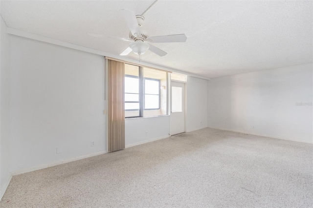 2617 Cove Cay Dr Unit 706, Clearwater, FL 33760 - spare room with carpet flooring and a ceiling fan