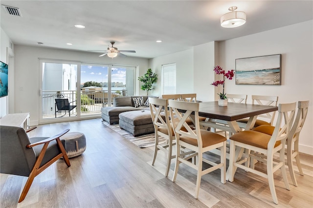 15305 1st St E Unit 305, Madeira Beach, FL 33708 - dining space featuring light wood finished floors, a ceiling fan, and recessed lighting