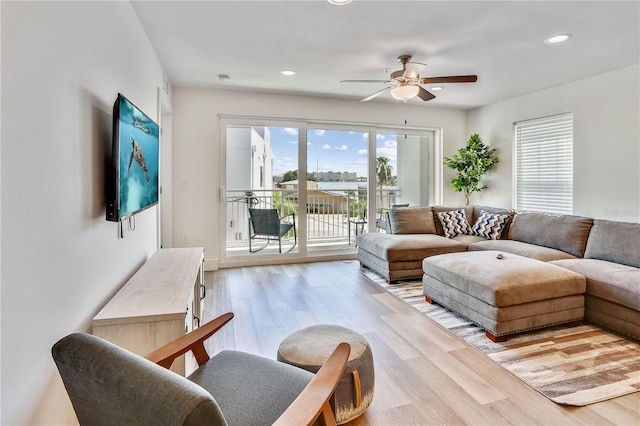 15305 1st St E Unit 305, Madeira Beach, FL 33708 - living area with a ceiling fan, light wood finished floors, and recessed lighting