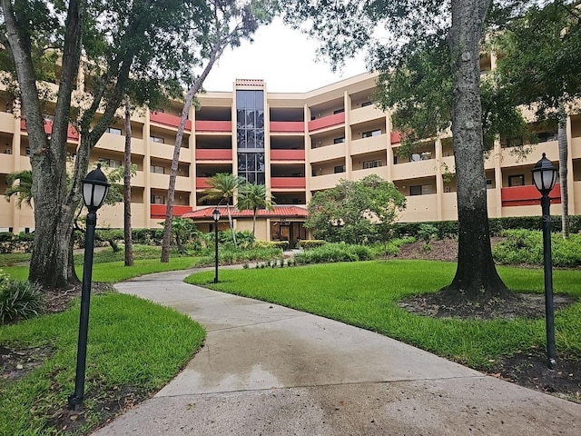 3076 Eastland Blvd Unit 210, Clearwater, FL 33761 - view of community with a lawn