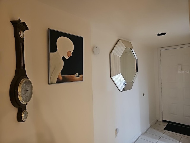 3076 Eastland Blvd Unit 210, Clearwater, FL 33761 - foyer with light tile patterned floors