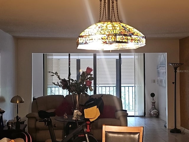 3076 Eastland Blvd Unit 210, Clearwater, FL 33761 - living room with tile patterned flooring and plenty of natural light